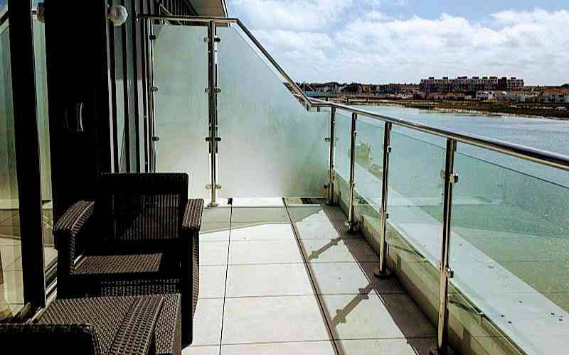 Etched privacy glass on stainless steel balustrade